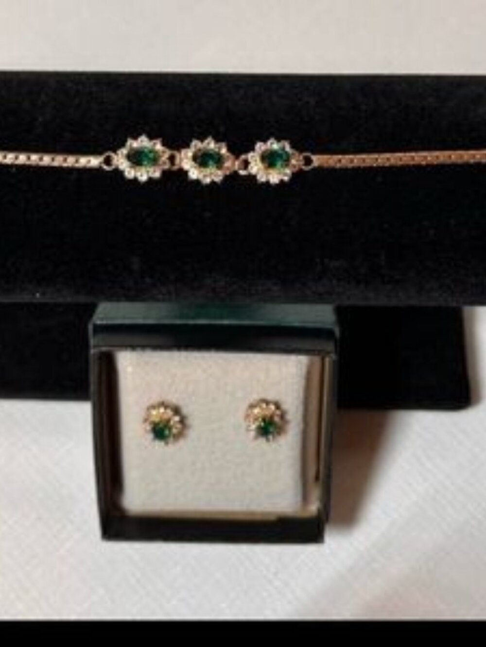 Fifth Avenue faux emerald diamond tennis bracelet and earrings. Nickel free
